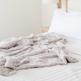 PATTERNED FAUX FUR THROW BLANKETS: Ivory